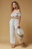 BELLS PANT BY SCANDAL ITALY IN BEIGE