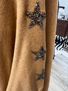 STAR DETAIL ON SCANDAL ITALY OLIVIA SWEATER  IN CARAMEL