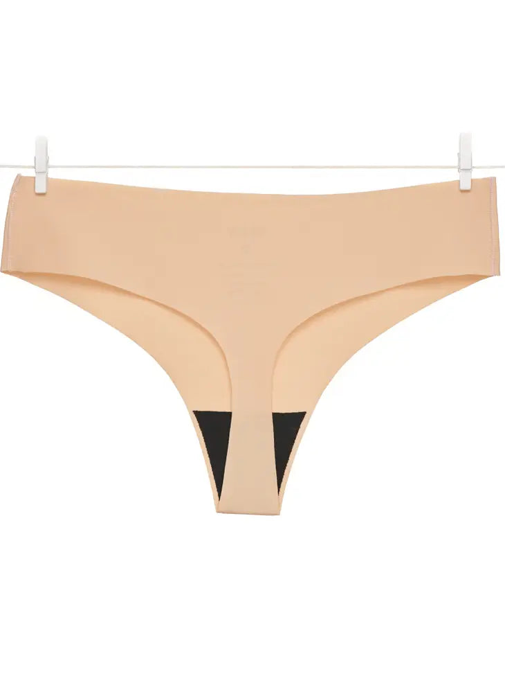 nude creme thong by Okko