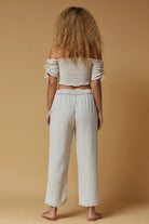 BELLS PANT BY SCANDAL ITALY IN BEIGE
