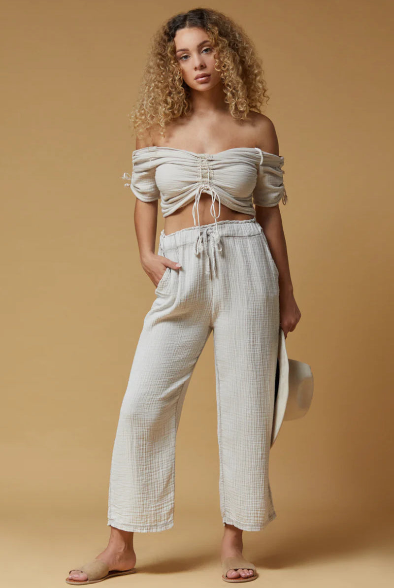 BELLS PANT BY SCANDAL ITALY IN BEIGE