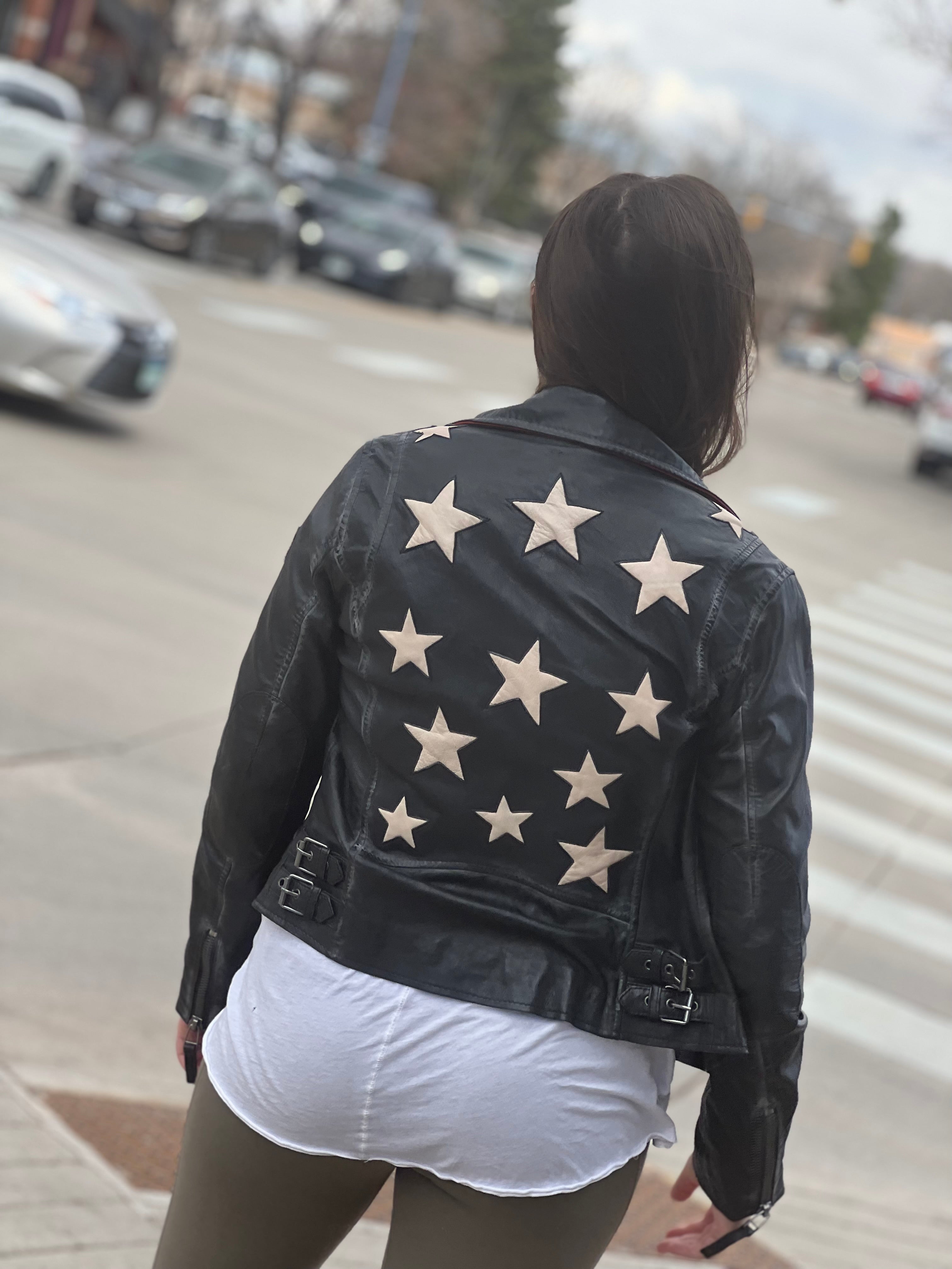 Black leather on sale jacket with stars